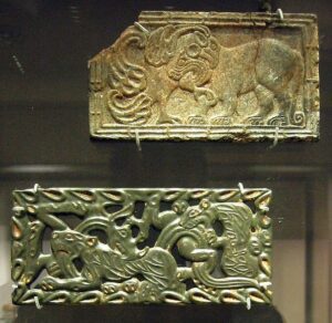 Chinese jade and steatite plaques, in the Scythian-style animal art of the steppes. 4th–3rd century BCE. British Museum.