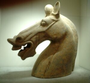 A ceramic horse head and neck (broken from the body), from the Chinese Eastern Han dynasty (1st–2nd century CE)