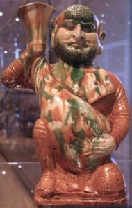 A Chinese sancai statue of a Sogdian man with a wineskin, Tang dynasty (618–907)